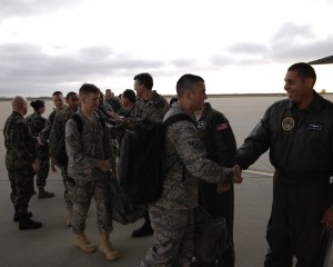 Maj. Santos Munoz, Joint Functional Component Command for Space, and other Vandenberg leadership give farewells to airmen boarding a C-5 Galaxy headed to McGuire AFB, NJ, on February 15. Thirty-six airmen from the 30th Space Wing were deployed in support of Joint Task Force Burnt Frost.  