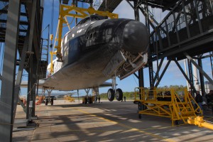 After sunrise at the Shuttle Landing Facility at Kennedy Space Center, the wheels on space shuttle Endeavour are lowered before its move to the Orbiter Processing Facility. On December 19, an X-ray of the orbiter showed evidence of a problem with a poppet, a kind of tapered plug that moves up and down in the valve to regulate flow.  