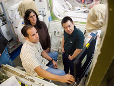 NASA Astronauts Sunita Williams and Joe Acaba (left), and Japan Aerospace Exploration Agency Astronaut Akihiko Hoshide, participate in an extravehicular-activity planning and preparation session in an International Space Station mock-up/trainer in the Space Vehicle Mock-Up Facility at Johnson Space