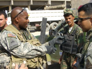 Army Capt. Chanda Mofu, left, prepares to lead a joint American-Iraqi patrol. Since returning from Iraq, where he commanded two infantry companies, Mofu has stepped up to play a leadership role on the CompanyCommand team. Photo courtesy of CompanyCommand