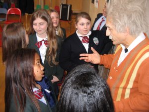Spiegel, as Einstein, interacts with students. 