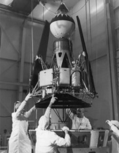 Technicians prepare the Ranger 4 satellite for use at the Parade of Progress show at the Public Hall in Cleveland, Ohio.  