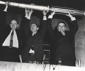 et Propulsion Laboratory Director Dr. James Pickering, Dr. James Van Allen of the State University of Iowa, and Army Ballistic Missile Agency Technical Director Dr. Wernher von Braun triumphantly display a model of the Explorer I, America’s first satellite, shortly after the satellite’s launch on January 31, 1958.  