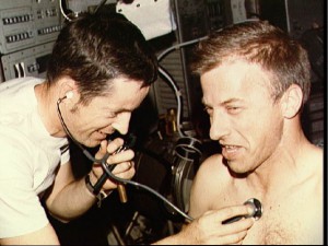 Astronaut Paul J. Weitz, Skylab 2 pilot, gets a physical examination by a fellow crewman during the twenty-eight-day Skylab 2 mission.  