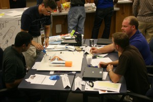 Teams brainstorm, sketch, and build possible solutions for projects during the IDEAS course.  