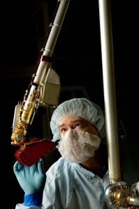 Spacecraft technician Billy Jones inspects the Phoenix Lander’s robotic arm, which was used to dig into the planet’s icy soil to study the history of water and search for complex organic molecules.  