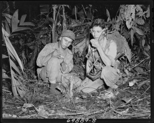Navajo Indian Code Talkers Henry Bake and George Kirk with a marine signal unit in December 1943.  