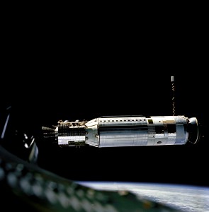 A profile view of the Agena Docking Target Vehicle as seen from the Gemini 8 spacecraft during rendezvous in space. 