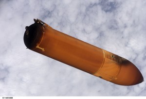 Handheld still image taken by Discovery’s crew of the external fuel tank as it was jettisoned after launch of STS-114.  