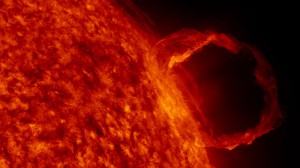  A massive plume of dense, cool (only compared with the rest of the solar atmosphere) plasma erupts on the sun’s surface, flowing in a loop along a magnetic field line