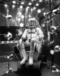 Scott Crossfield sits in a thermal-vacuum chamber during tests of a prototype XMC-2 pressure suit. Production versions of this suit were used for thirty-six early X-15 flights. 