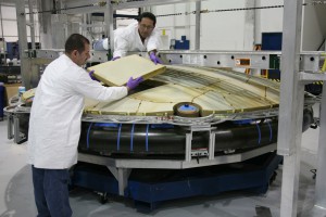 Test placement of the PICA-X tiles on the first Dragon flight's heat-shield carrier structure. During reentry the lightweight tiles withstand temperatures as high as 2,000°C (3,620°F). 