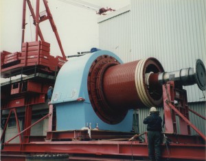 One of four alternating-current drive motors, rated 65,000 horsepower each, just before installation into the Unitary Wind Tunnel.  