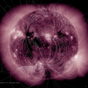This illustration maps the magnetic field lines emanating from the sun and their interactions superimposed on an extreme ultraviolet image from SDO. 
