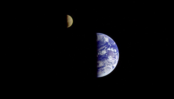 Eight days after its final encounter with Earth, the Galileo spacecraft looked back and captured this remarkable view of Earth and the moon.
