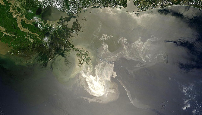 Sunlight illuminated the lingering oil slick off the Mississippi Delta on May 24, 2010. Photo Credit: NASA