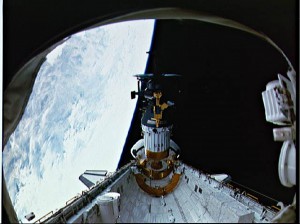 During STS-34, the Galileo spacecraft atop the inertial upper stage is deployed from Atlantis's payload bay. 