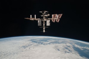 The International Space Station and the docked Space Shuttle Endeavour photographed by Expedition 27 crew member Paolo Nespoli from the Soyuz TMA-20 following its undocking on May 23, 2011.