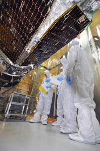 Engineers in the final stages of assembling NuSTAR.