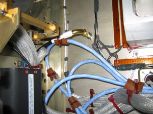 Integrating SpaceWire with the SCaN Testbed required eventually rebuilding several cables, rerouting cables to improve bend radii, and adding padding for tie-downs.