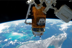 In the grasp of the International Space Station’s Canadarm-2, JAXA’s Kounotori-2 H-II Transfer Vehicle is moved from the space-facing side of the Harmony node back to the Earth-facing port of Harmony.