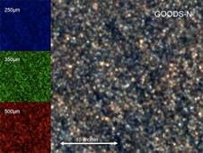 A false-color image of thousands of distant, extremely luminous, unresolved galaxies as seen by SPIRE