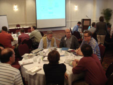 PI-mission team members work through a knowledge capture activity