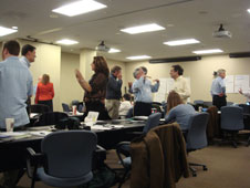 Forum attendees converse during a break