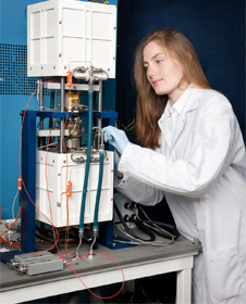 Stacey Bagg working on the Advanced Stirling Convertor (ASC) hardware.
