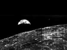 The world's first view of Earth as released to the public taken by a spacecraft from the vicinity of the Moon. The photo was transmitted to Earth by the United States Lunar Orbiter I and received at the NASA tracking station at Robledo De Chavela near Madrid, Spain.