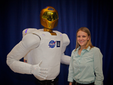 C.J. Kanelakos, mechanical engineer at Johnson Space Center, with the R2 torso.