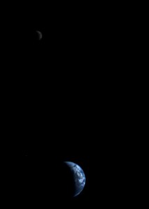 This picture of a crescent-shaped Earth and Moon — the first of its kind ever taken by a spacecraft — was recorded Sept. 18, 1977, by NASA's Voyager 2 when it was 7.25 million miles (11.66 million kilometers) from Earth. Voyager 2 was launched on Aug. 20, 1977, 16 days before its twin, Voyager 1.