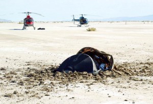 The Genesis sample return capsule crash-landing in the Utah desert.