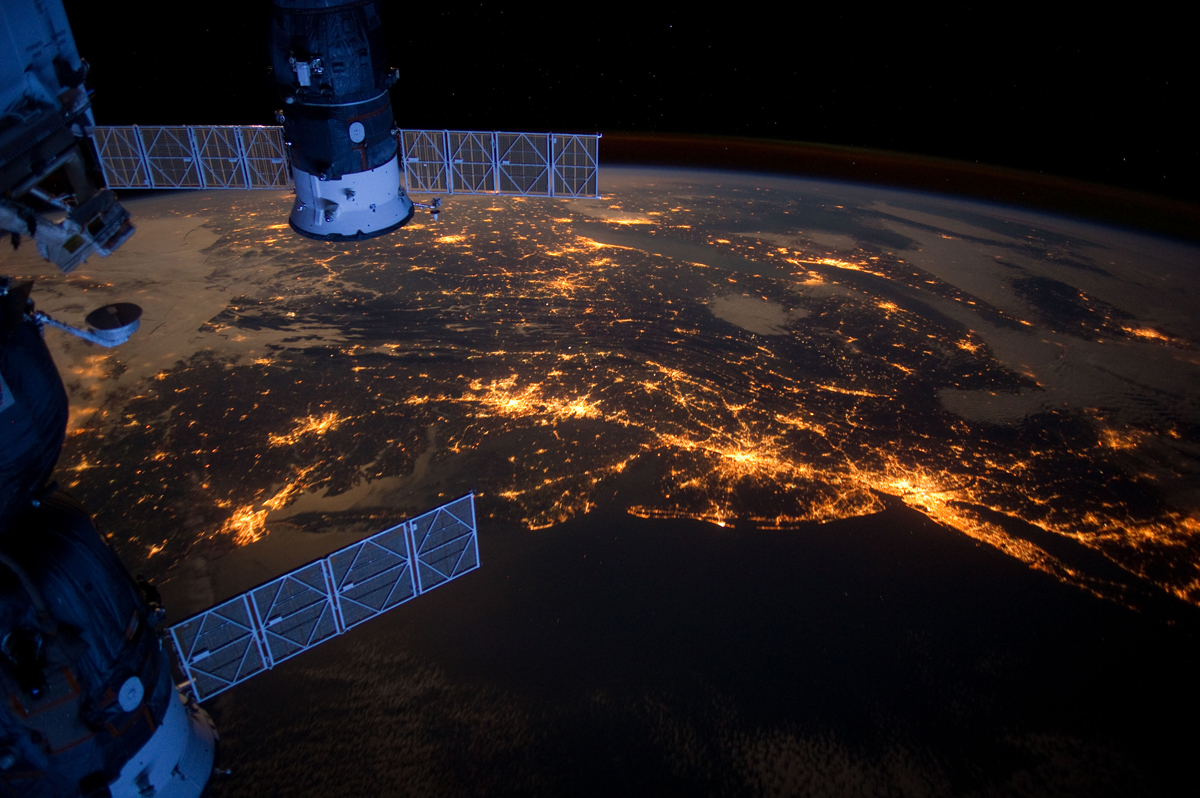 An Expedition 30 crew member aboard the International Space Station took this nighttime photograph of much of the Atlantic coast of the United States. Large metropolitan areas and other easily recognizable sites from the Virginia/Maryland/Washington, D.C. area are visible in the image that spans almost to Rhode Island. Boston is just out of frame at right. Long Island and the New York City area are visible in the lower right quadrant. Philadelphia and Pittsburgh are near the center. Parts of two Russian vehicles parked at the orbital outpost are seen in left foreground.