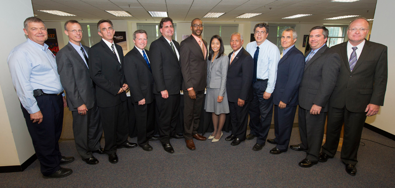 Class photo of the 2012 Systems Engineering Leadership Development Program (SELDP) graduates with NASA Chief Engineer Mike Ryschkewitsch (far left), Boeing Chief Engineer Paul Lambertson (second from left), and NASA Administrator Charlie Bolden (center).