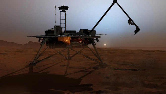 In this artist's concept illustration, NASA's Phoenix Mars Lander begins to shut down operations as winter sets in. The far-northern latitudes on Mars experience no sunlight during winter. This will mark the end of the mission because the solar panels can no longer charge the batteries on the lander. Frost covering the region as the atmosphere cools will bury the lander in ice.