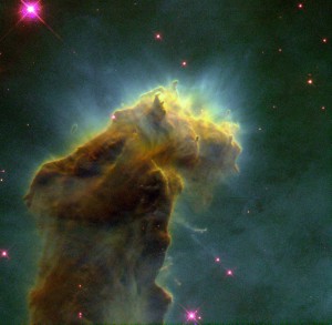 This eerie, dark structure, resembling an imaginary sea serpent's head, is a column of cool molecular hydrogen gas (two atoms of hydrogen in each molecule) and dust that is an incubator for new stars. It is found in the "Eagle Nebula" (also called M16 -- the 16th object in Charles Messier's 18th century catalog of "fuzzy" permanent objects in the sky), a nearby star-forming region 7,000 light-years away in the constellation Serpens. The picture was taken on April 1, 1995 with the Hubble Space Telescope Wide Field and Planetary Camera 2.