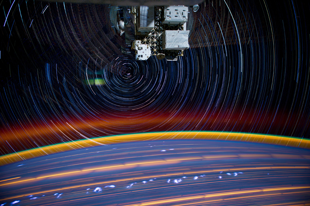 COVERThis is a composite of a series of images photographed from a mounted camera on the Earth-orbiting International Space Station, from approximately 240 miles above Earth. Expedition 31 Flight Engineer Don Pettit said of the photographic techniques used to achieve the images: “My star-trail images are made by taking a time exposure of about 10 to 15 minutes. However, with modern digital cameras, 30 seconds is about the longest exposure possible, due to electronic-detector noise effectively snowing out the image. To achieve the longer exposures I do what many amateur astronomers do. I take multiple 30-second exposures, then ‘stack’ them using imaging software, thus producing the longer exposure.” A total of 18 images photographed by the astronaut-monitored stationary camera were combined to create this composite.