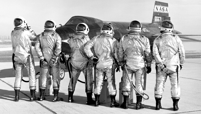 The X-15 pilots clown around in front of the #2 aircraft. From left to right: USAF Capt. Joseph Engle, USAF Maj. Robert Rushworth, NASA test pilot John "Jack" McKay, USAF Maj. William "Pete" Knight, NASA test pilot Milton Thompson, and NASA test pilot William Dana.