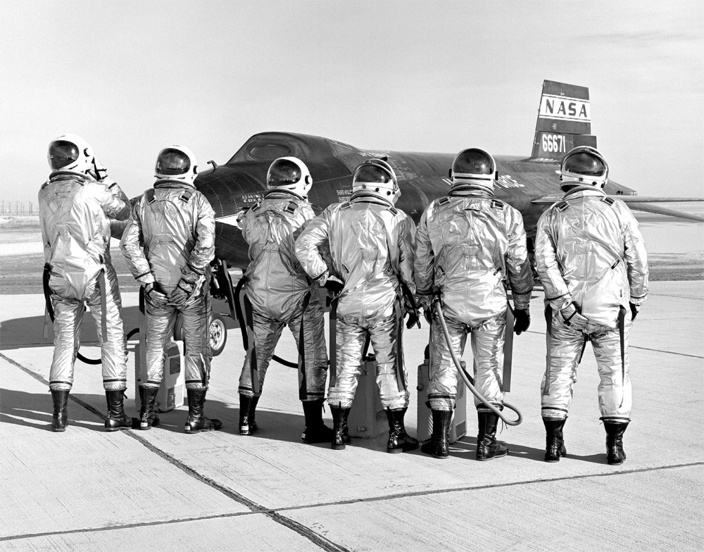 The X-15 pilots clown around in front of the #2 aircraft. From left to right: USAF Capt. Joseph Engle, USAF Maj. Robert Rushworth, NASA test pilot John "Jack" McKay, USAF Maj. William "Pete" Knight, NASA test pilot Milton Thompson, and NASA test pilot William Dana.