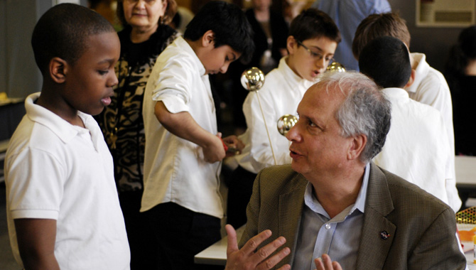 Dr. Ed Hoffman, NASA Chief Knowledge Officer, talks with P.S. 199 5th grader. This aspiring young student explains to Dr. Hoffman that he will one day soon be his boss and he will have to do what he asks him to do... he says, "I will be your boss one day." Photos all credited to Berette Macaulay, SeBiArt.com