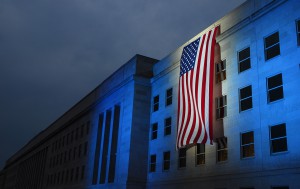 An illuminated American flag is displayed at the Pentagon near the spot where American Airlines Flight 77 crashed into the building on September 11.
