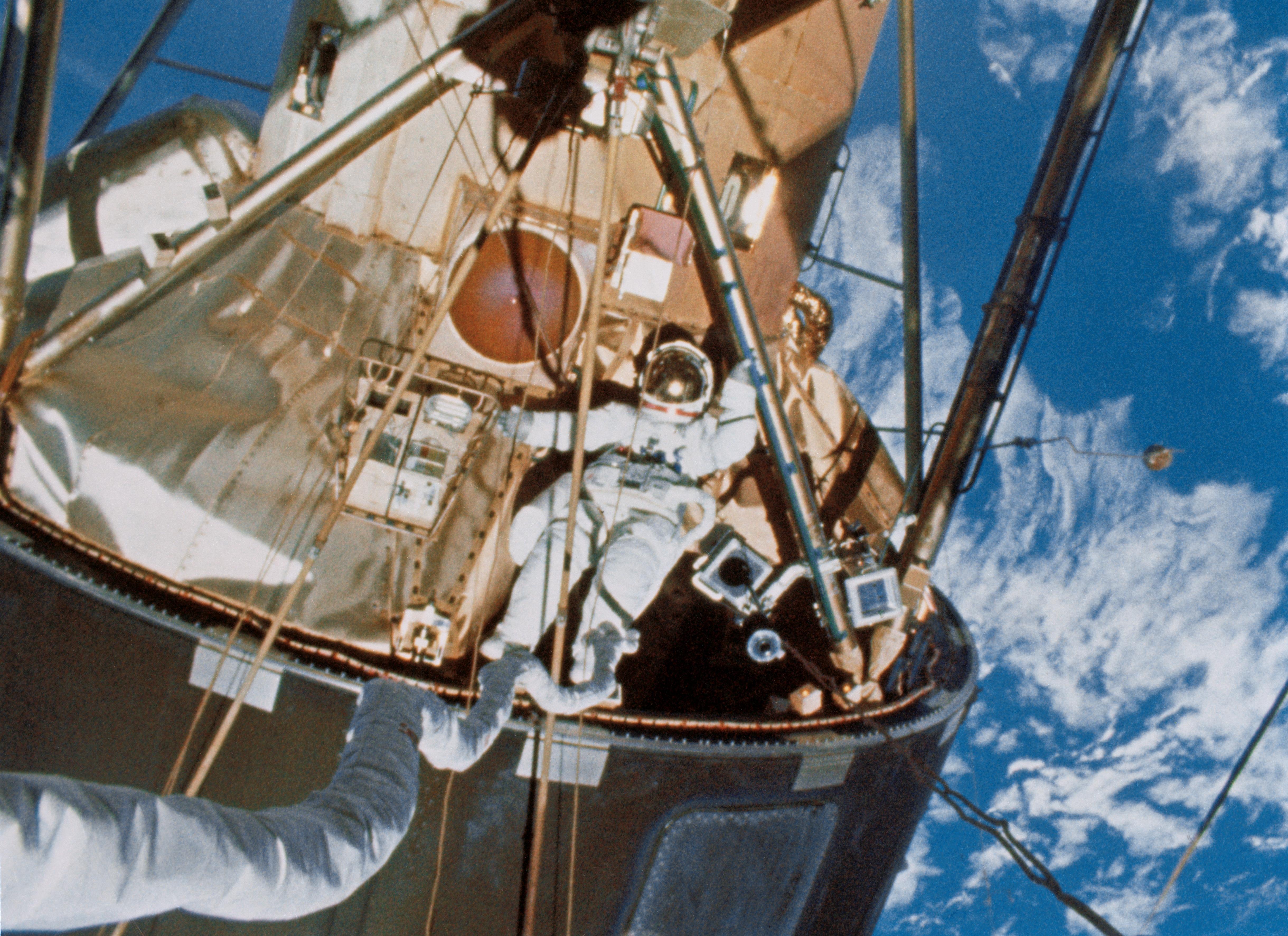 Scientist-astronaut Edward G. Gibson has just exited the Skylab extravehicular activity hatchway. Astronaut Gerald P. Carr, Skylab 4 commander, took this picture during the final Skylab spacewalk that took place on Feb. 3, 1974. Carr was above on the Apollo Telescope Mount when he shot this frame of Gibson. Note Carr's umbilical/tether line extending from inside the space station up toward the camera. Astronaut William R. Pogue, Skylab 4 pilot, remained inside the space station during the spacewalk by Carr and Gibson. Credit: NASA.