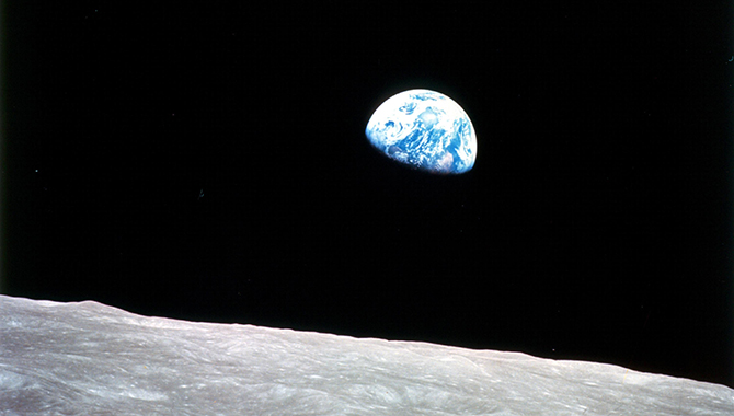 Apollo 8, the first manned mission to the moon, entered lunar orbit on Christmas Eve, Dec. 24, 1968. That evening, the astronauts-Commander Frank Borman, Command Module Pilot Jim Lovell, and Lunar Module Pilot William Anders-held a live broadcast from lunar orbit, in which they showed pictures of the Earth and moon as seen from their spacecraft. Said Lovell, "The vast loneliness is awe-inspiring and it makes you realize just what you have back there on Earth." They ended the broadcast with the crew taking turns reading from the book of Genesis.