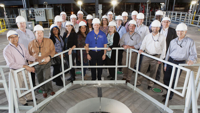 Members of NASA’s Engineering Management Board pause for a group photo during a tour of the Vehicle Assembly Building at Kennedy Space Center in Florida. Credit: NASA