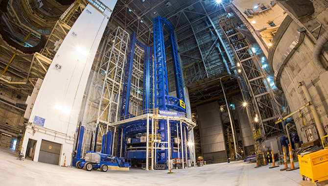 The 170-foot Vertical Assembly Center (VAC) is the world’s largest spacecraft welding tool. It will be used to build the core stage of the SLS. Photo Credit: NASA