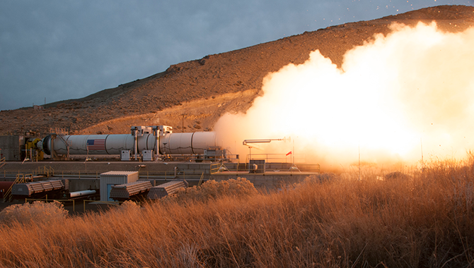 The SLS solid rocket motor fires up during its successful hot motor test on March 11, 2015. Photo Credit: Orbital ATK