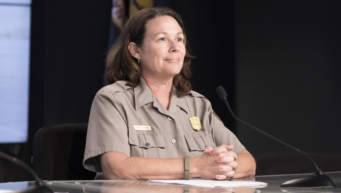 Laura Henning, public information officer for the Canaveral National Seashore, speaks to members of the media at a news conference to discuss upcoming flight tests to study the effects of sonic booms. Credit: NASA