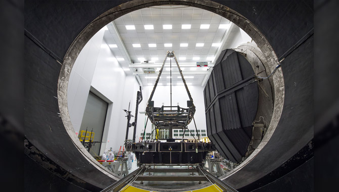 The Pathfinder, a test model of the James Webb Space Telescope, prepares to enter the giant thermal vacuum chamber known as Chamber A for cryogenic testing. Photo Credit: Chris Gunn