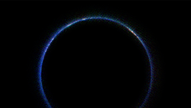Image taken by the New Horizons spacecraft on July 14, 2015, looking back at Pluto after the flyby. This first look at Pluto’s atmosphere in infrared wavelengths was made with data from the New Horizons Ralph/Linear Etalon Imaging Spectral Array (LEISA) instrument. Photo Credit: NASA/JHUAPL/SwRI